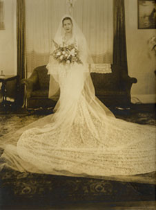 A black and white photo of Johnnie Mae in her lace chantilly gown