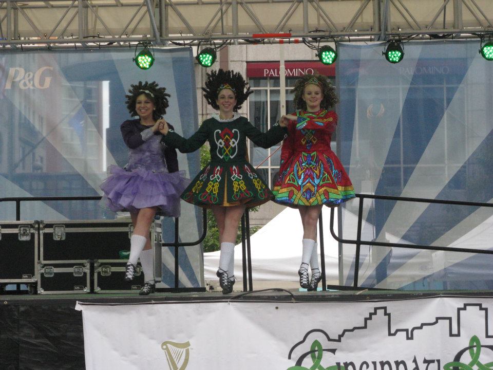 “Cincinnati Celtic Festival 2011 Mid Dance” This is a photo taken during the Three Hand Reel. Some ceili dances have names like the “Siege of Ennis,” and others are named for how many people are dancing and what kind of dance it is, like the “Three Hand Reel.” There are three dancers (three hand) dancing to a Reel.
