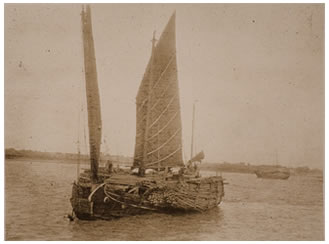 Chinese junks loaded with lumber on Woosung River