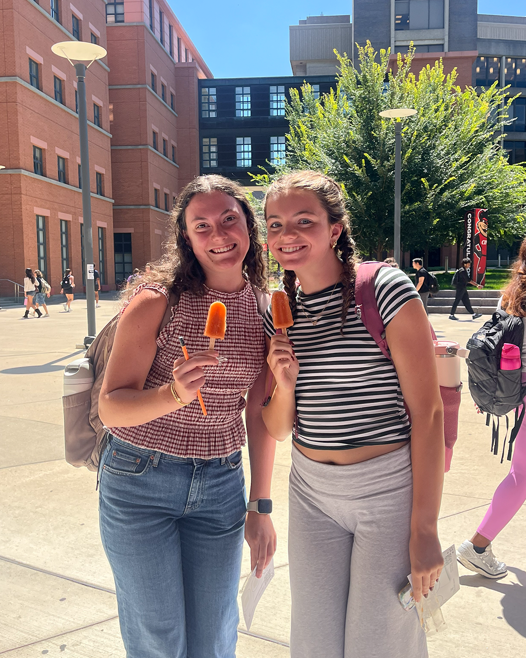 students with popsicles