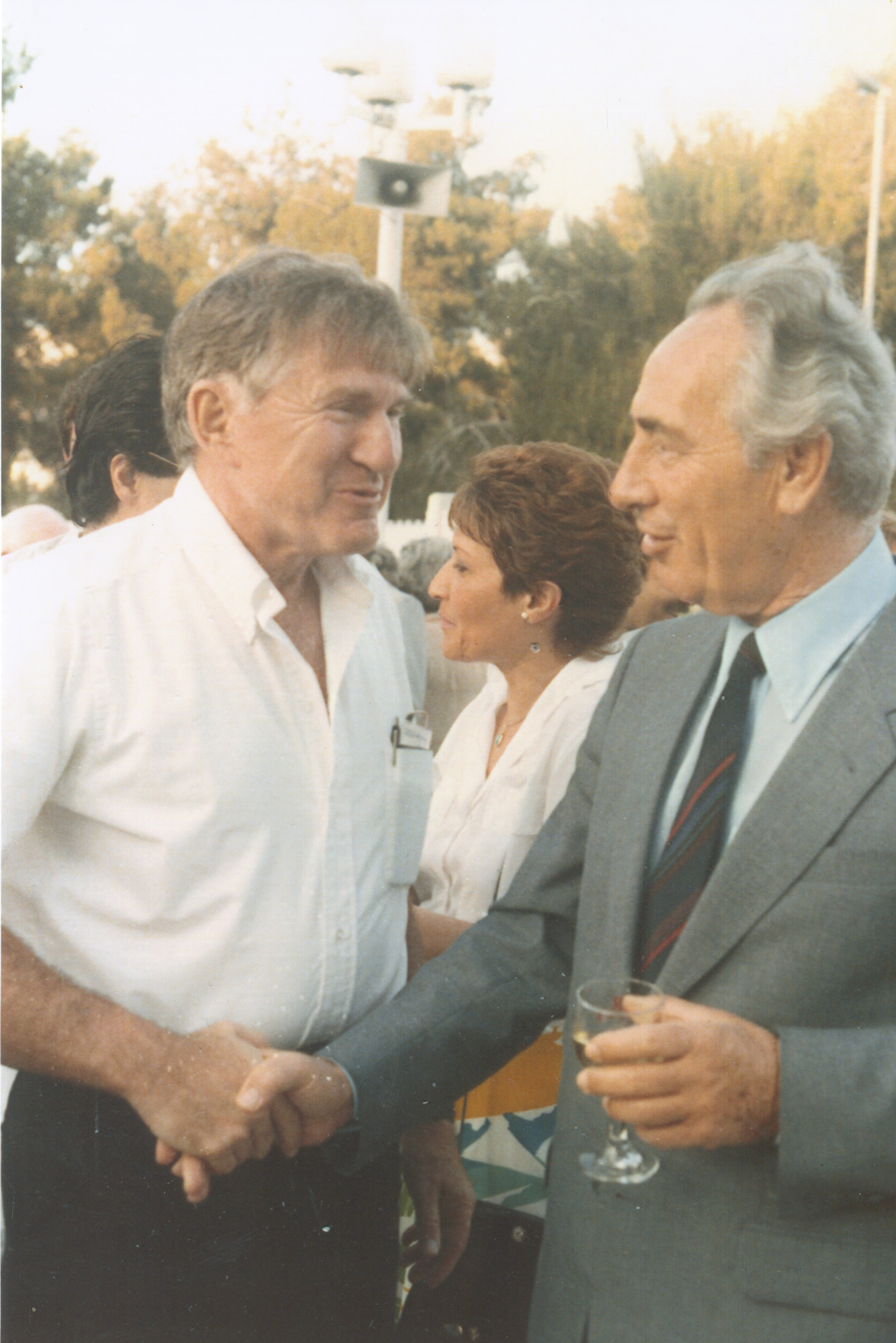 A photograph of Gettler with Prime Minister of Israel Shimon Peres