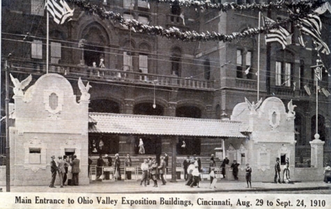 At right is another postcard image, this time showing the main entrance to the exposition buildings. The facade on the sidewalk area in front of the main building was constructed specifically for the exposition and taken down afterwards.