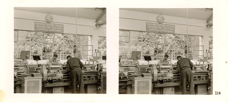 Stereo photo showing workers in one of the model factories, circa 1937