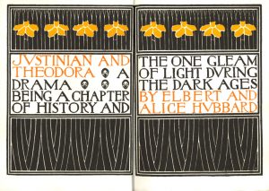 A two page spread with a black and yellow flower motif