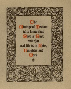 A gray page with a vine motif and some text highlighted in orange.