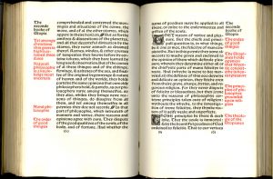 A two page spread.  The main text is in black and the margin notes are in red.