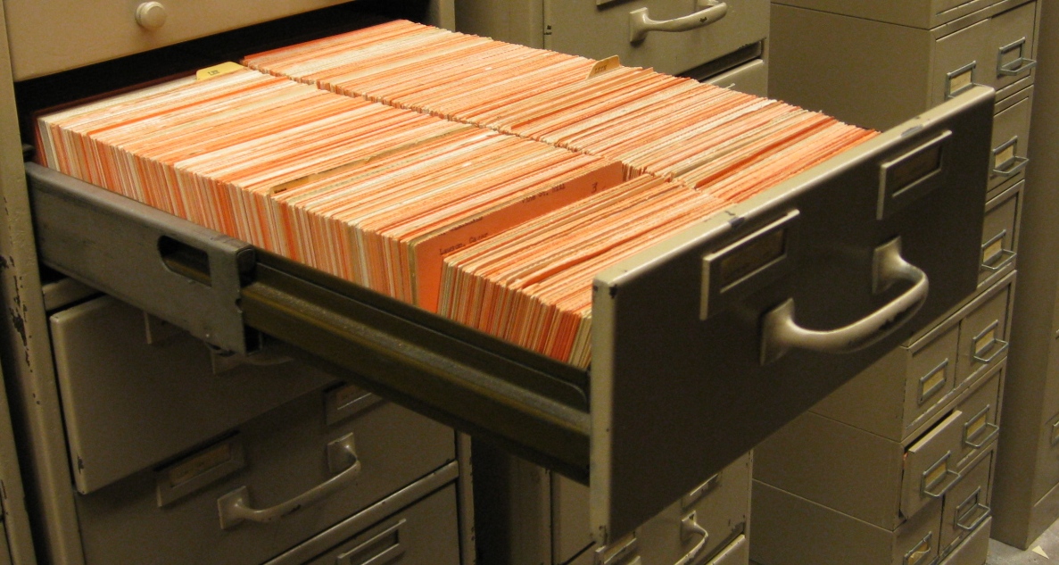 One of the many filing cabinets filled with birth and death records.