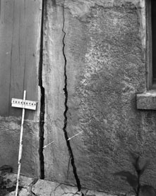Wall Crack and Ruler showing damage