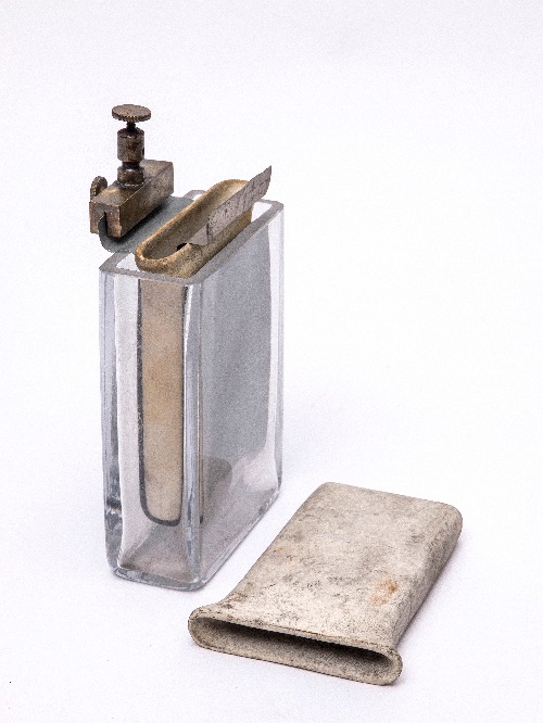 An actual surviving example of the Grove cell and a spare ceramic spacer.