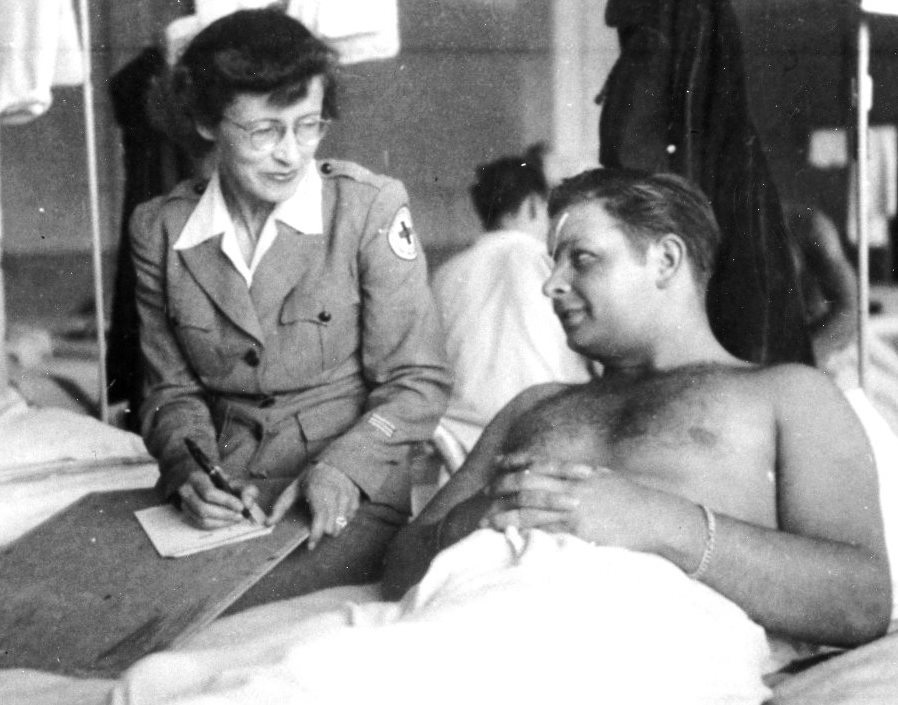 Barbara Lincoln Ashbaugh writing for a patient, Tongres, Belgium ca. 1945