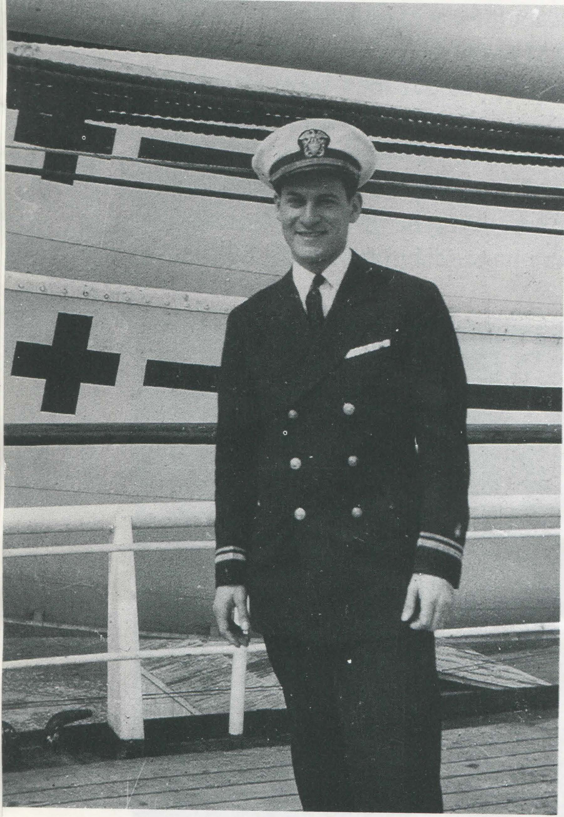 Dr. Heimlich in front of the hospital ship Repose