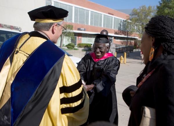 UC Graduate Samuel Ochiel Obura is greeting on campus by Richard Harknett, head of UC's political science department, 48 years after Mr. Obura finished his degree requirements.  photos/Joseph Fuqua II.
