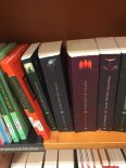 Catalan version of Harry Potter books on a shelf.
