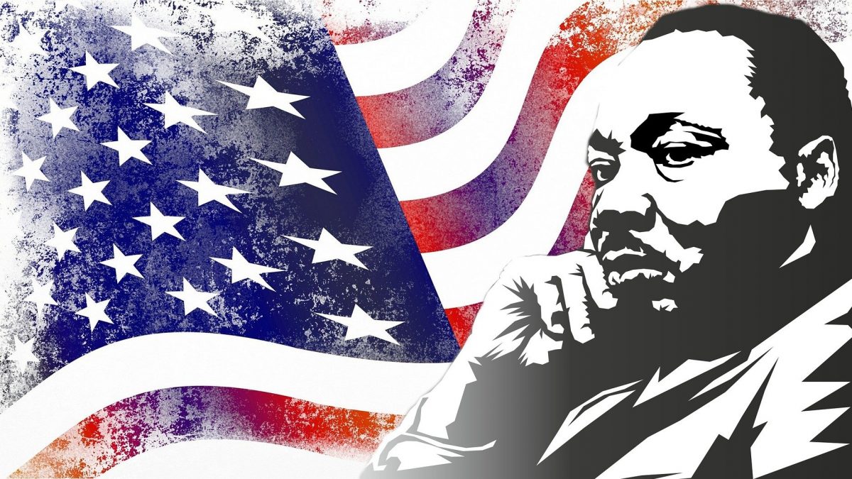 Martin Luther King in front of US flag