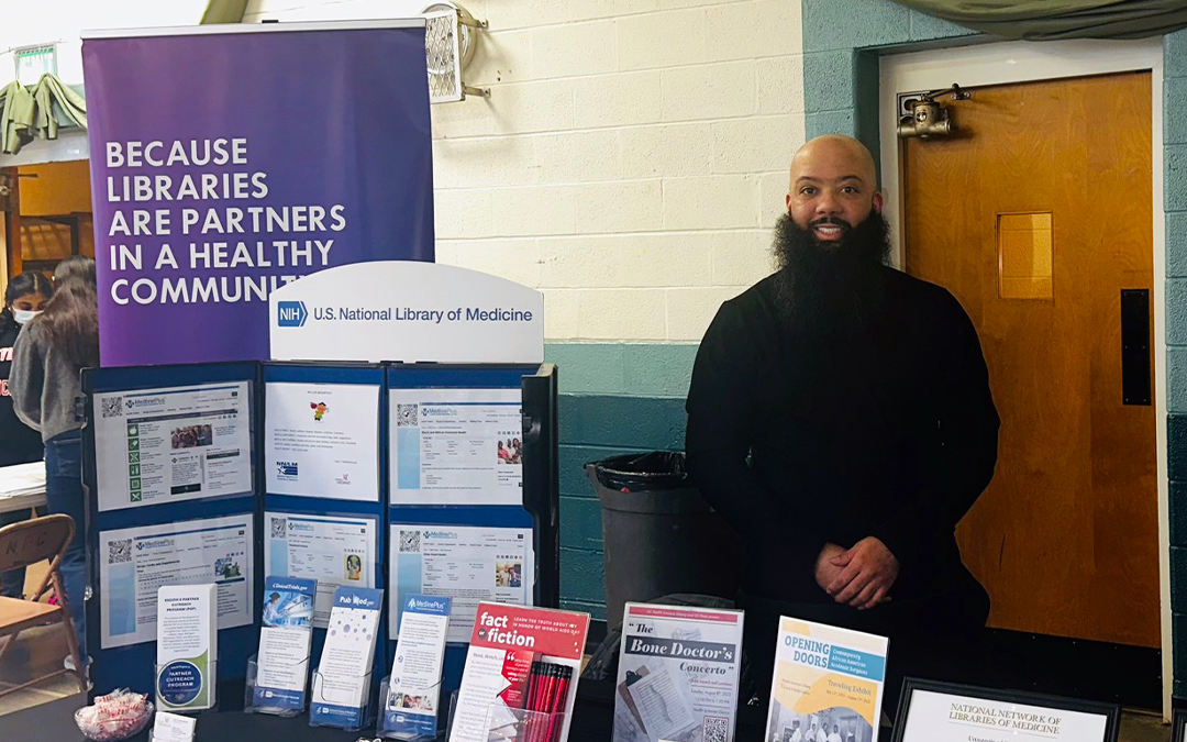 Don Jason at the Health Sciences Library table. 