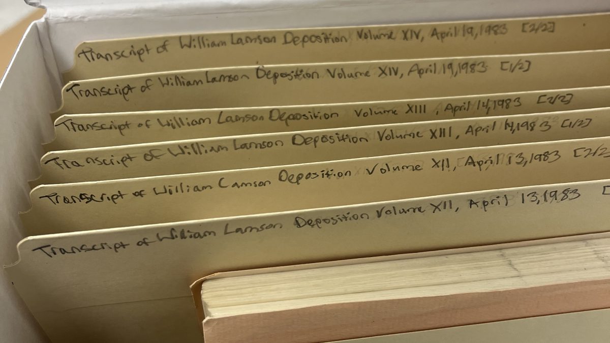 Photo of labeled folders sitting in archival box without the box cover.
