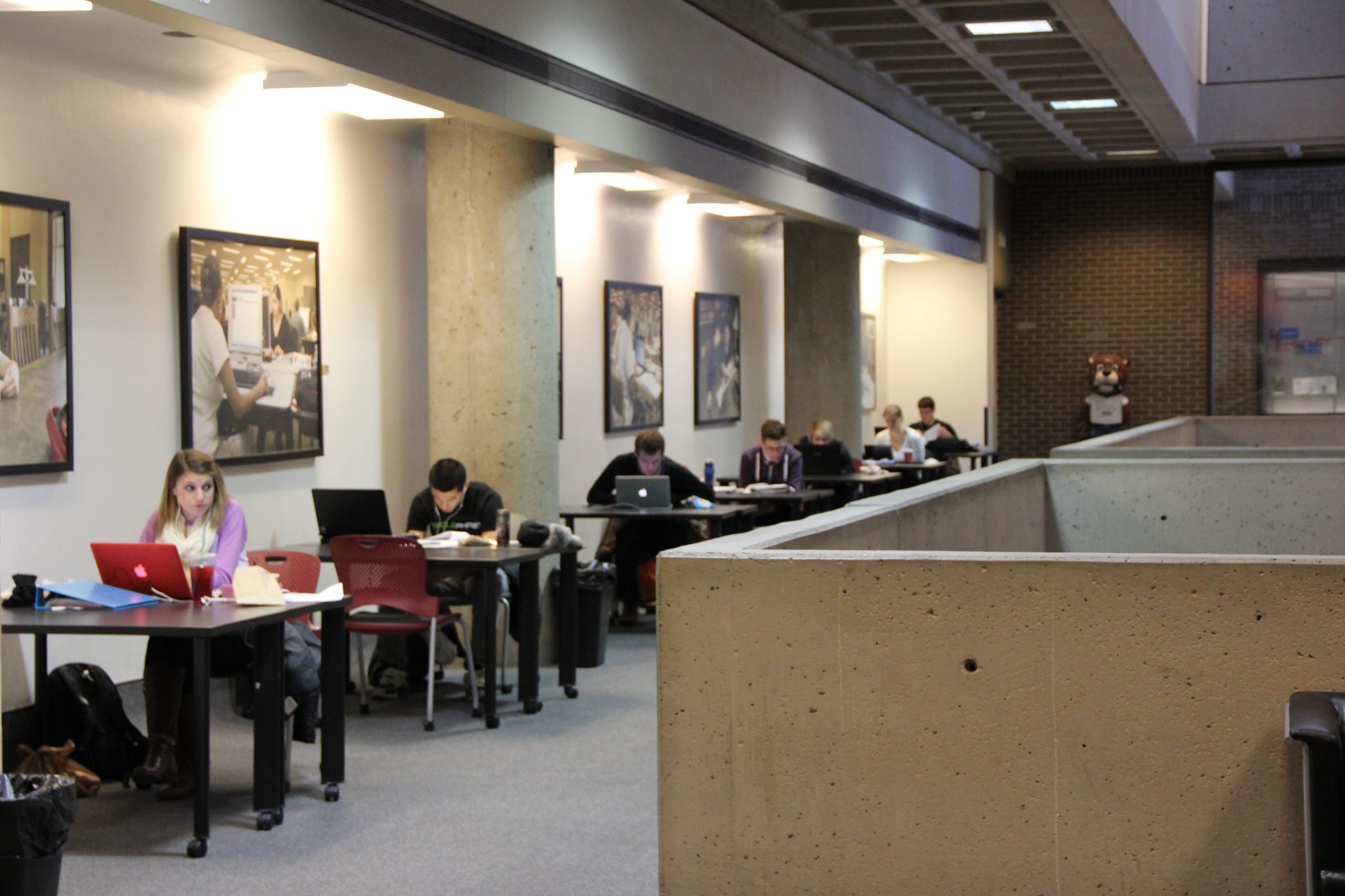 students studying in Langsam Library