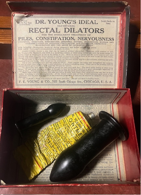 Set of hard rubber rectal dilators.  Advertised as a “cure-all” for constipation, hemorrhoids, nervousness, headache, and other conditions, circa 1890
