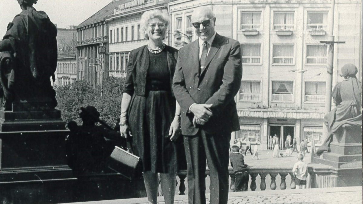 Photograph of Kenneth Caster and his wife Anneliese standing together while visiting Prague in the 1960s.