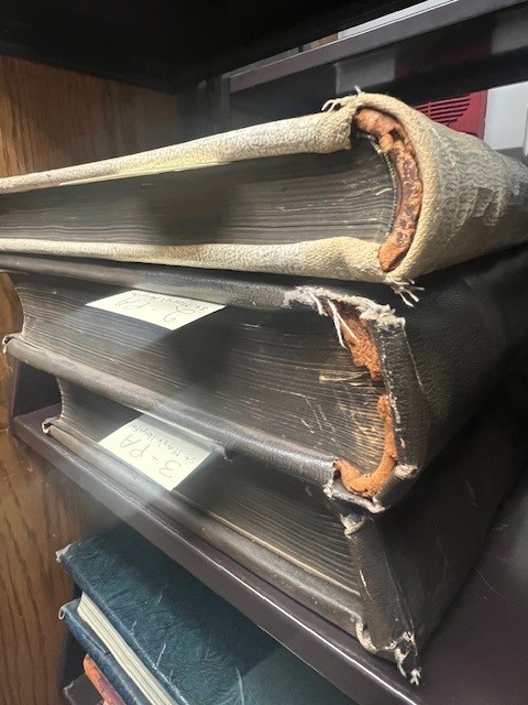 Saint Mary's Hospital Collection ledgers. Many of the ledgers are oversized and weigh approximately 40 lbs.