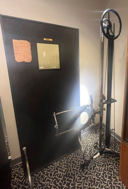 Bar-Ray Products X-ray Stitching Stand, circa 1940s and Kelley-Koett Manufacturing Company X-ray machine, circa 1920 on display at the Henry R. Winkler Center for the History of the Health Professions.