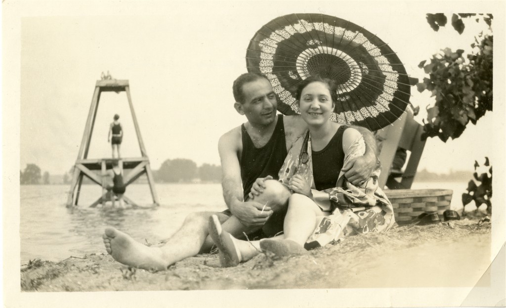 Ladislas Segoe and Vilma Segoe at the beach, circa 1926 Author:Unknown Photograph of Segoe and Vilma sitting under a sun umbrella on the beach; unknown location. Includes manuscript notes on verso. Date: 1926