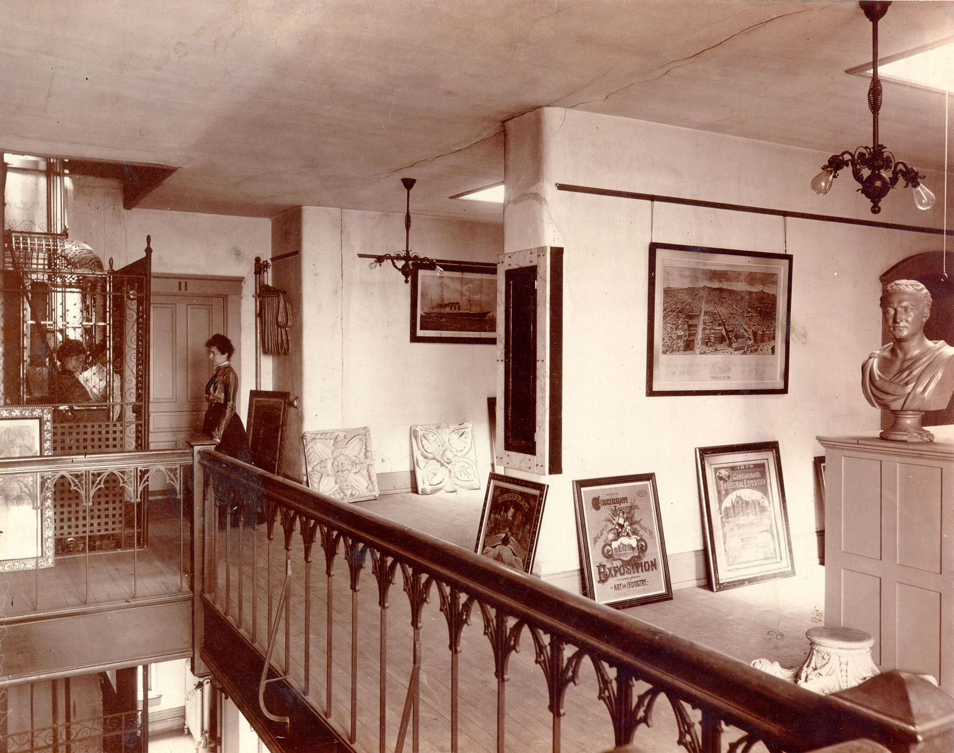 Interior of Greenwood Hall, showing posters on walls