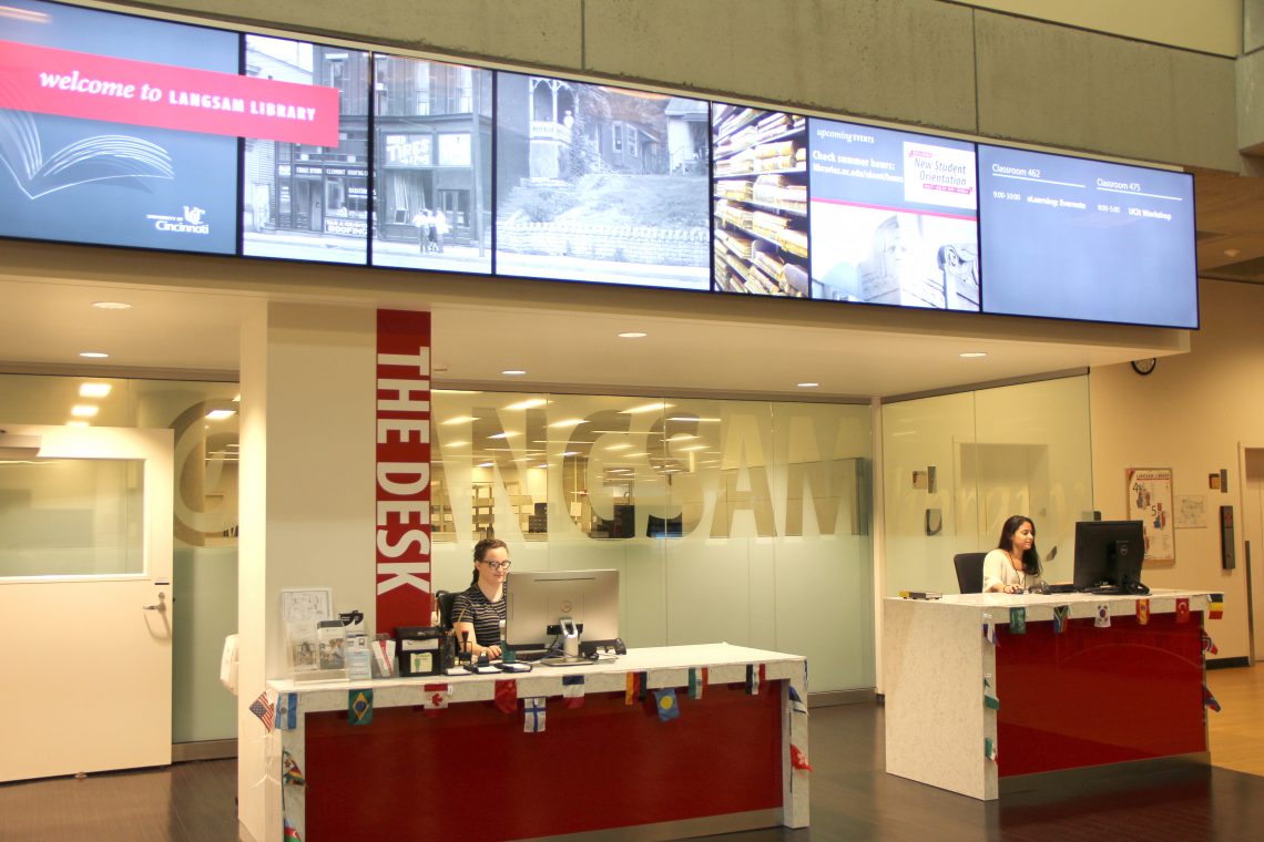 student workers at the desk in langsam