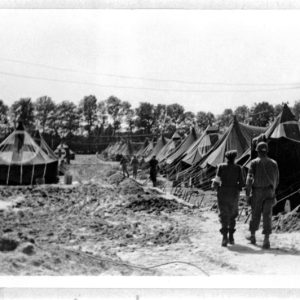 Setting up tents on concrete bases to form a hospital in Lison, France.