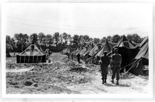 Setting up tents on concrete bases to form a hospital in Lison, France.