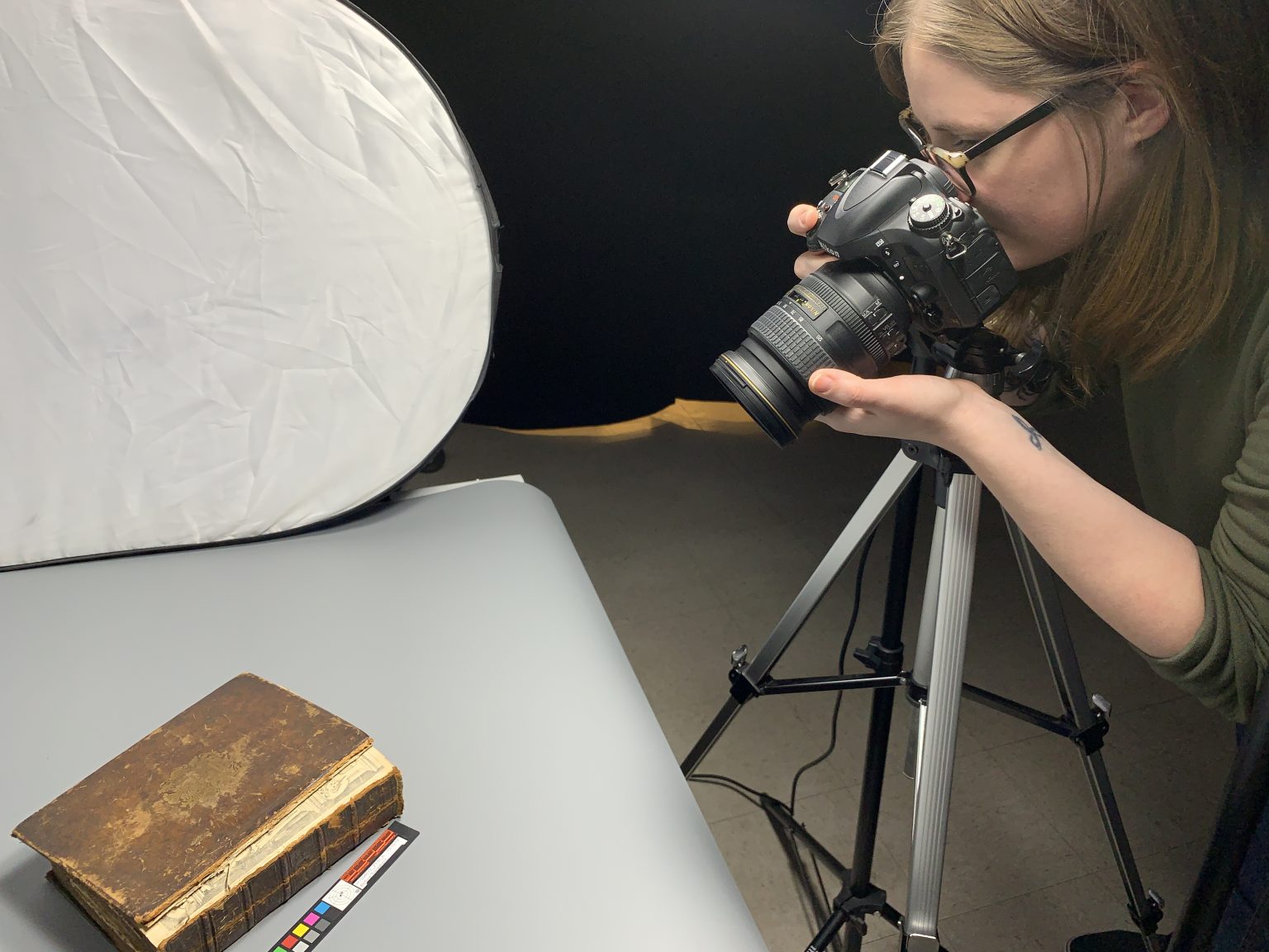 jessica ebert photographing a book