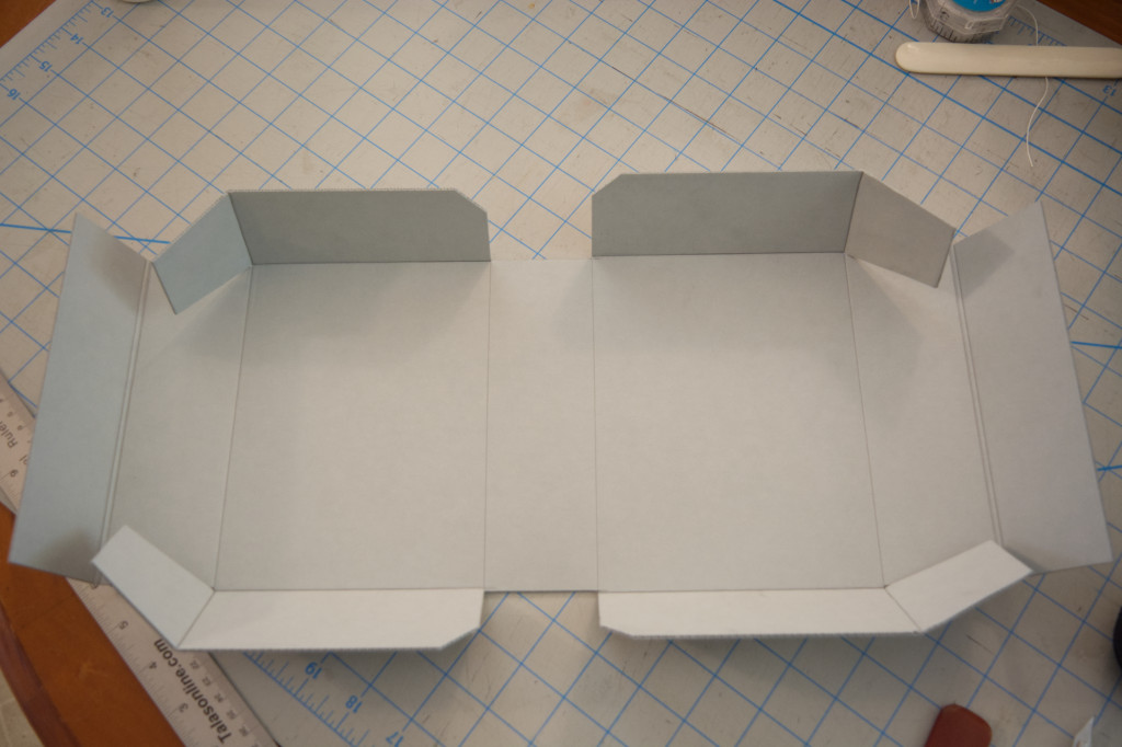 Corrugated board with cuts and folds complete.