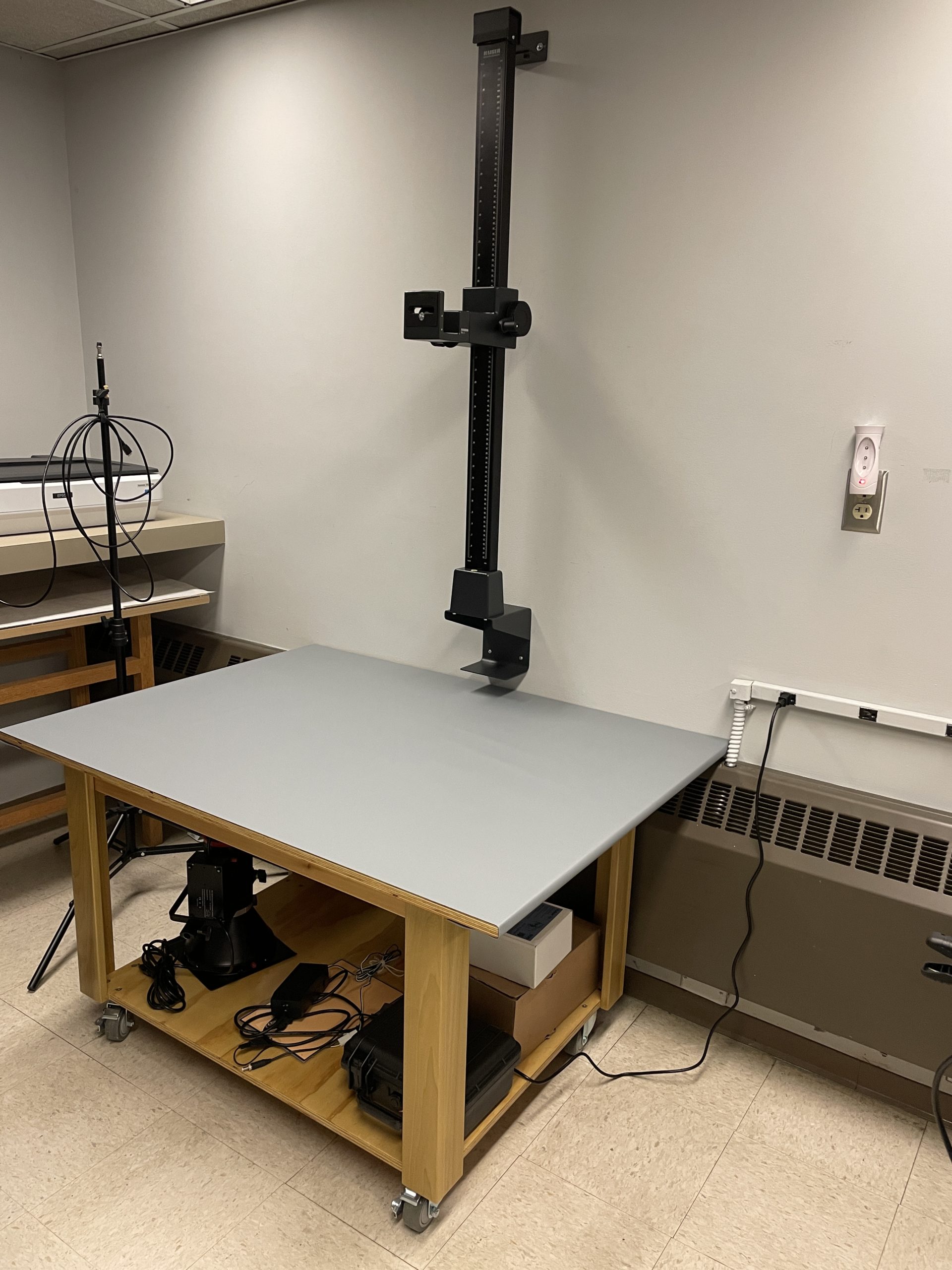 image of our new and improved, wall-mounted copy stand setup