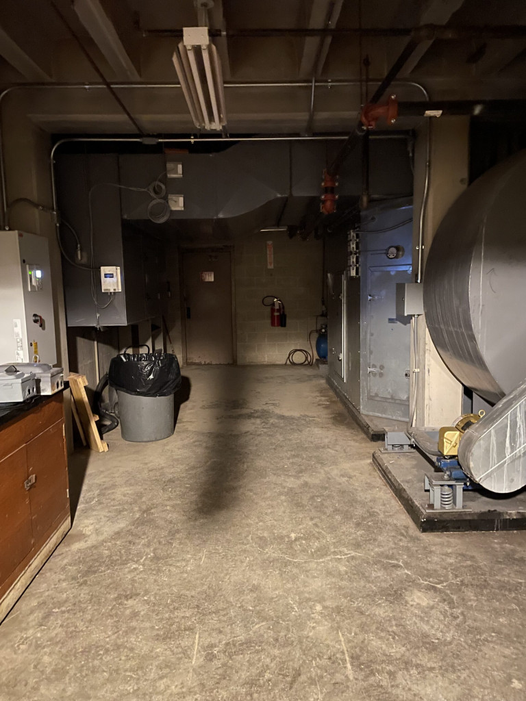 image of a creepy basement with mechanical equipment