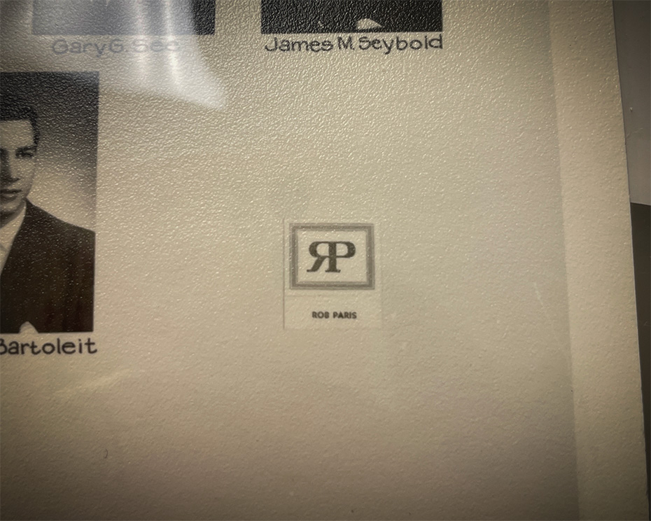 Close up of a composite photo with Rob Paris logo written in cursive script.