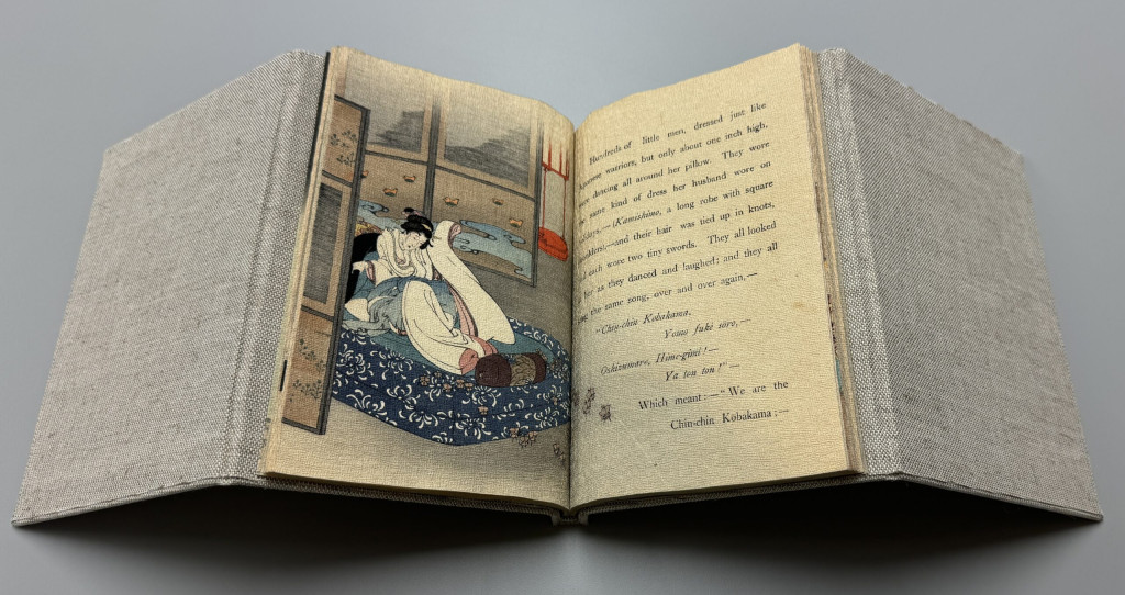 volume sitting in cradle open