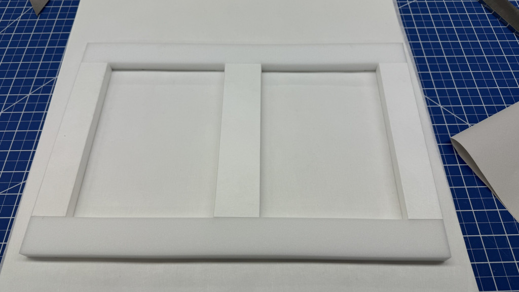 Foam insert being covered in Tyvek