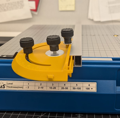 Image of adjustable guides on the Hercules foam cutter.