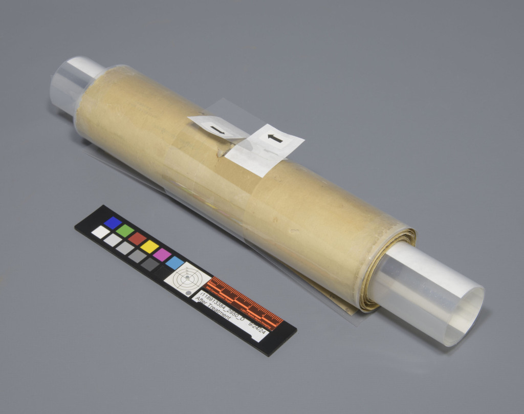 rolled scroll with belly band to hold it in place
