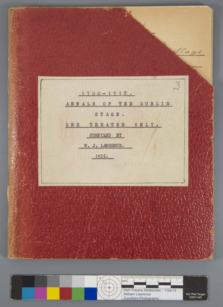 Overhead of a notebook with a missing corner.