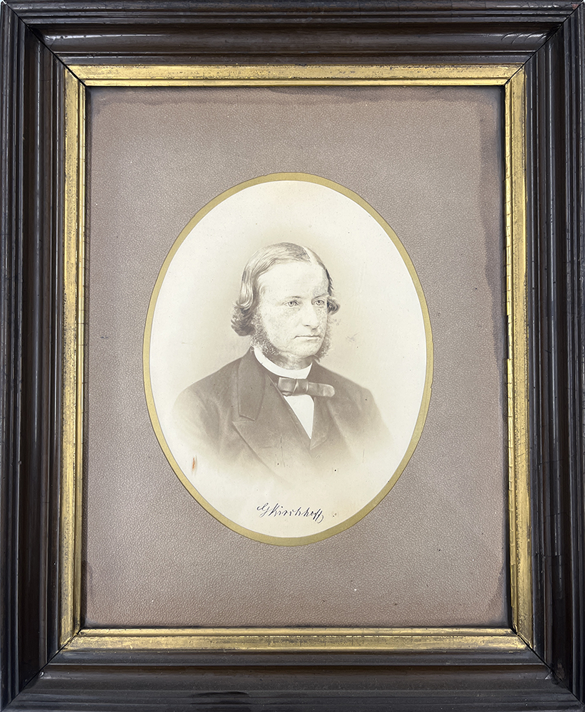 Framed photograph of a man in a suit