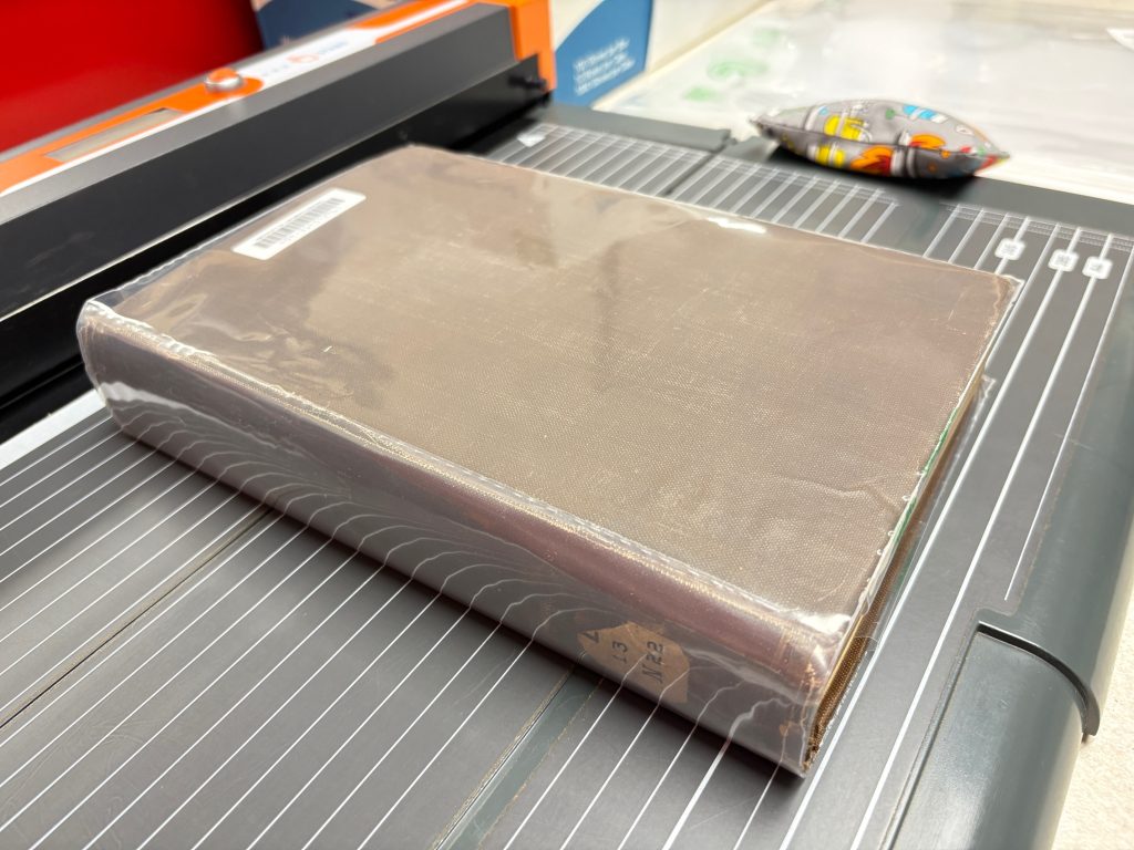 Overall view of book with finished CoLibri jacket with encapsulated spine.