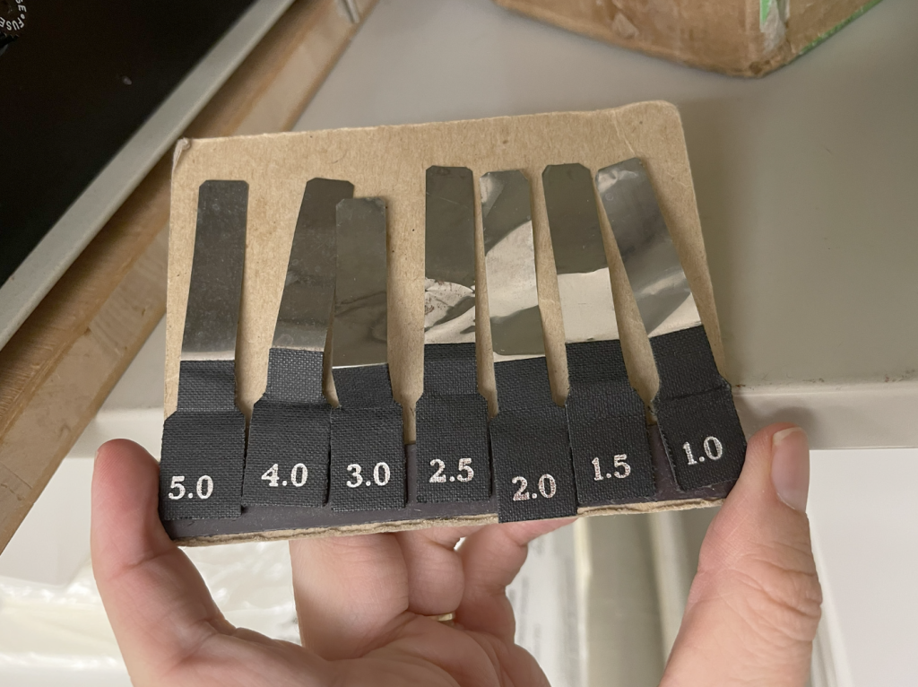 Metal shims stored on a magnetic mount