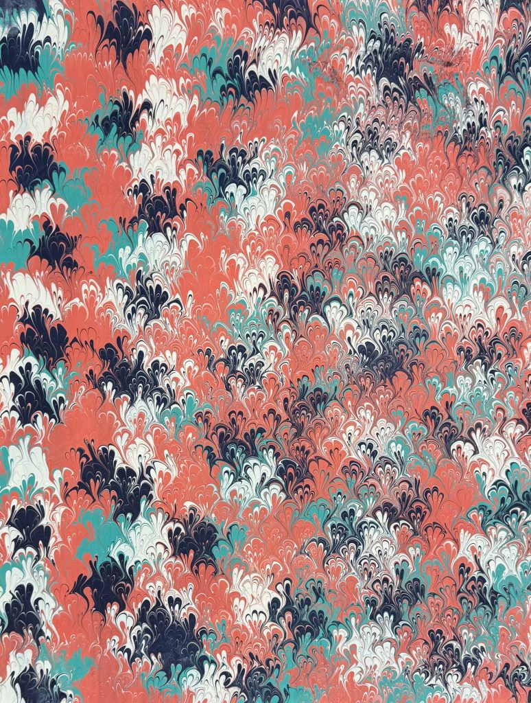 Bouquet pattern in shades of coral, navy, teal and white.