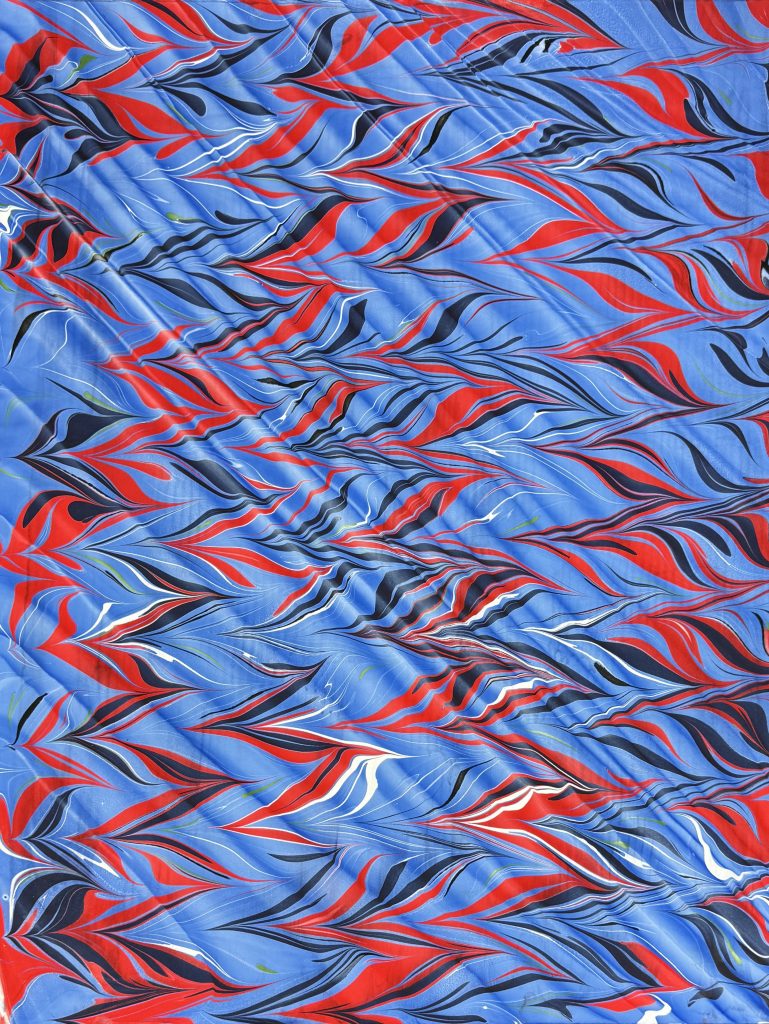Get-gel or gel-git with Spanish wave in shades of blue, red, navy and white.