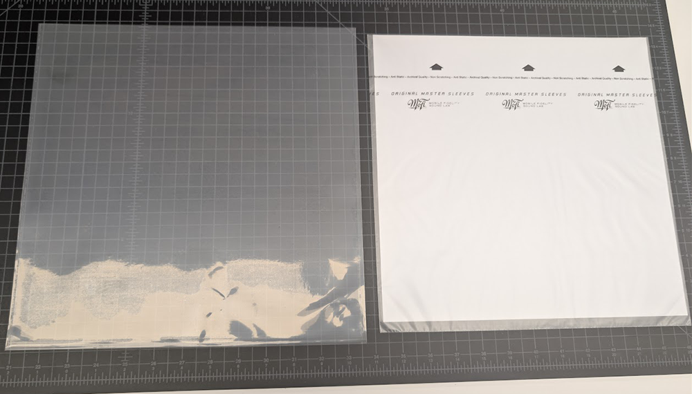 Two new archival sleeves, the outer sleeve is on the left and the inner sleeve is on the right.