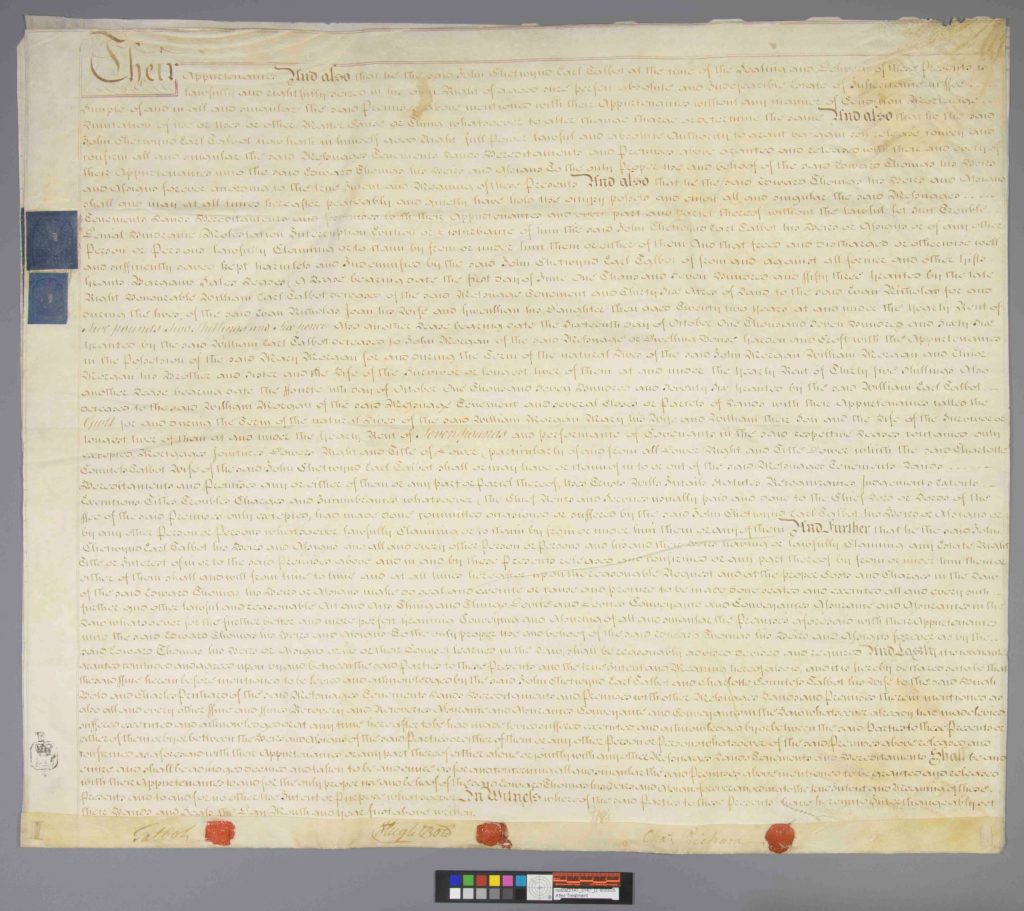 Overhead view of a multi-leaf document with creases and folds reduced after treatment.