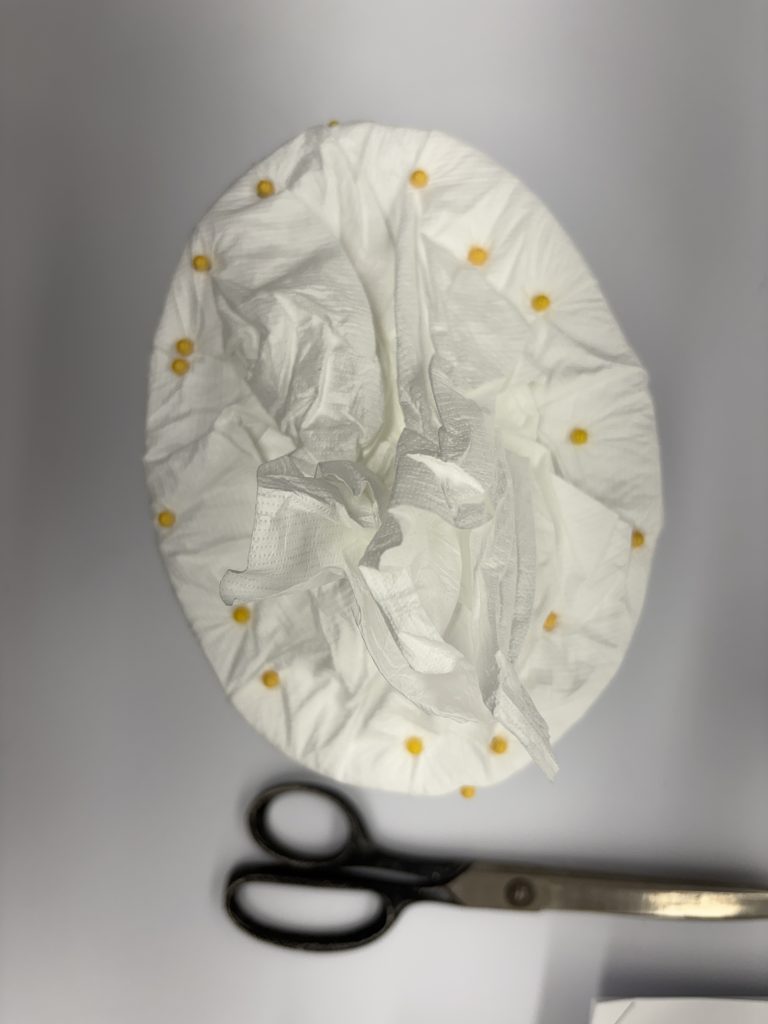 Tyvek pinned to package of ethafoam and batting.