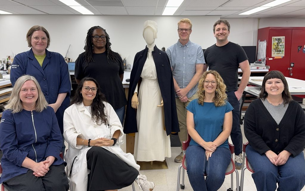 Preservation lab staff and Howard Sutcliffe with the dressed nurse mannequin.